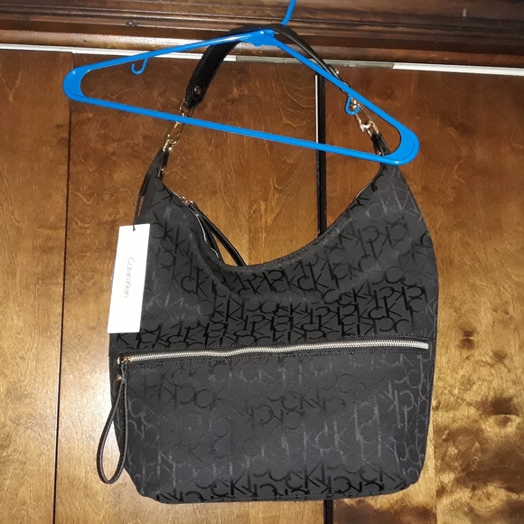 Calvin Klein Handbags - NWT Calvin Klein Purse
